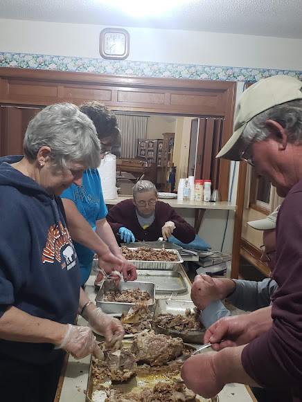 Volunteers prepping food for a Forever Jen Memorial Fundraiser